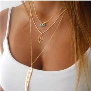 NWT feather three layer chain necklace gold color